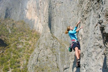 female mom rock climbing mountain climbing mount everest determination analogy